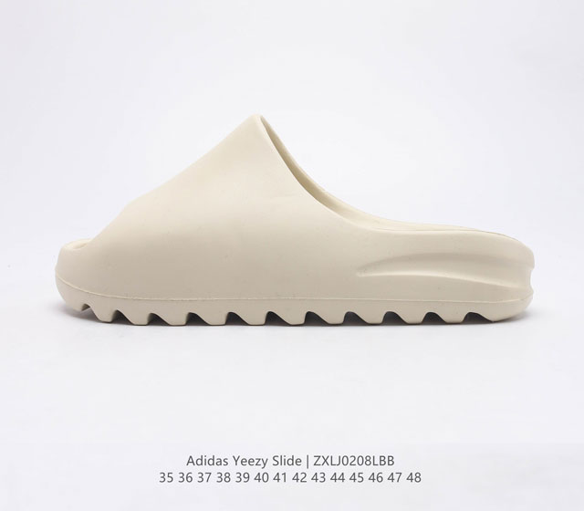 阿迪达斯 Adidas YEEZY SLIDE 经典运动拖鞋时尚厚底增高男女一字拖鞋 YEEZY SLIDE椰子拖鞋的外观十分吸引人 融合了舒适与时尚的元素 延