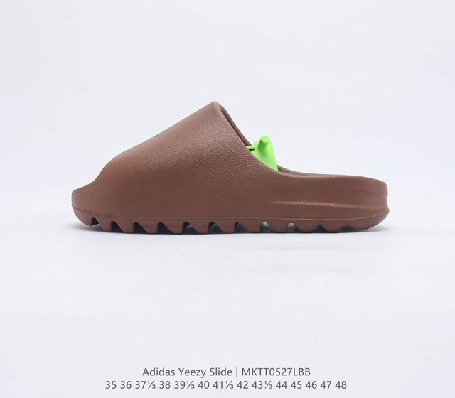 阿迪达斯 Adidas YEEZY SLIDE 经典运动拖鞋时尚厚底增高男女一字拖鞋 YEEZY SLIDE椰子拖鞋的外观十分吸引人 融合了舒适与时尚