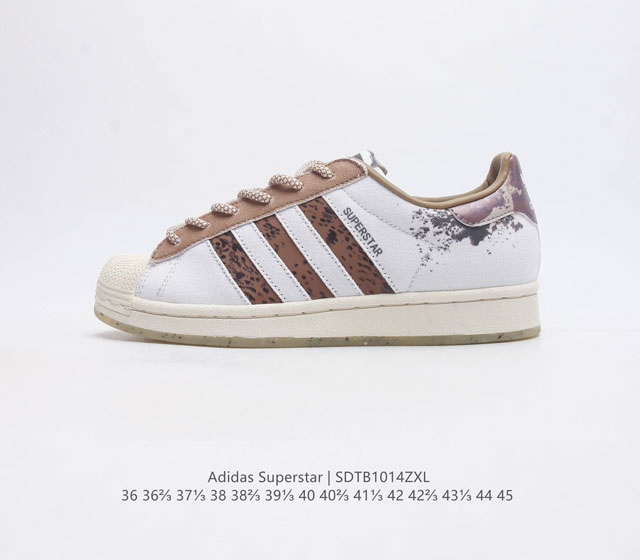 阿迪达斯 Adidas Superstar 三叶草经典贝壳头系列 新款休闲板鞋潮流男女士运动鞋 鞋面柔软皮革织物拼接材质 标志性的贝壳鞋头 锯齿三条纹 简约的线