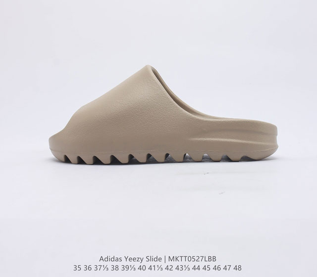 阿迪达斯 Adidas Yeezy Slide 经典运动拖鞋时尚厚底增高男女一字拖鞋 Yeezy Slide椰子拖鞋的外观十分吸引人 融合了舒适与时尚的元素 延