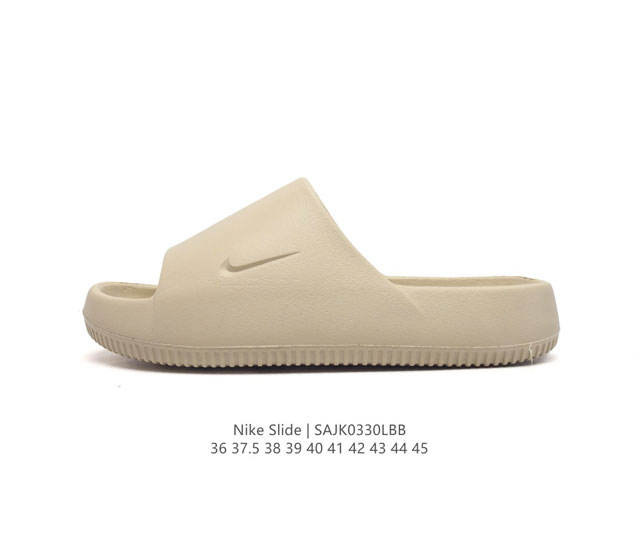 耐克 Nike Calm Slide 经典运动拖鞋时尚厚底增高男女一字拖鞋 沙滩鞋 拖鞋的外观十分吸引人 融合了舒适与时尚的元素 延续了简约独特的美学风尚 一体