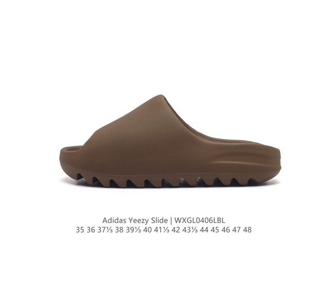 阿迪达斯 Adidas Yeezy Slide 经典运动拖鞋时尚厚底增高男女一字拖鞋。Yeezy Slide椰子拖鞋的外观十分吸引人，融合了舒适与时尚的元素，延