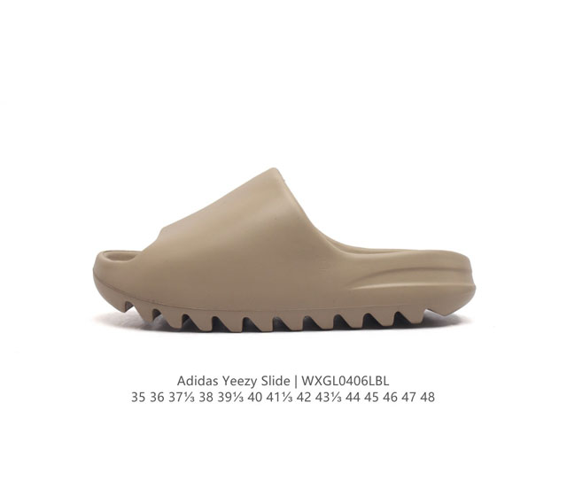 阿迪达斯 Adidas Yeezy Slide 经典运动拖鞋时尚厚底增高男女一字拖鞋。Yeezy Slide椰子拖鞋的外观十分吸引人，融合了舒适与时尚的元素，延