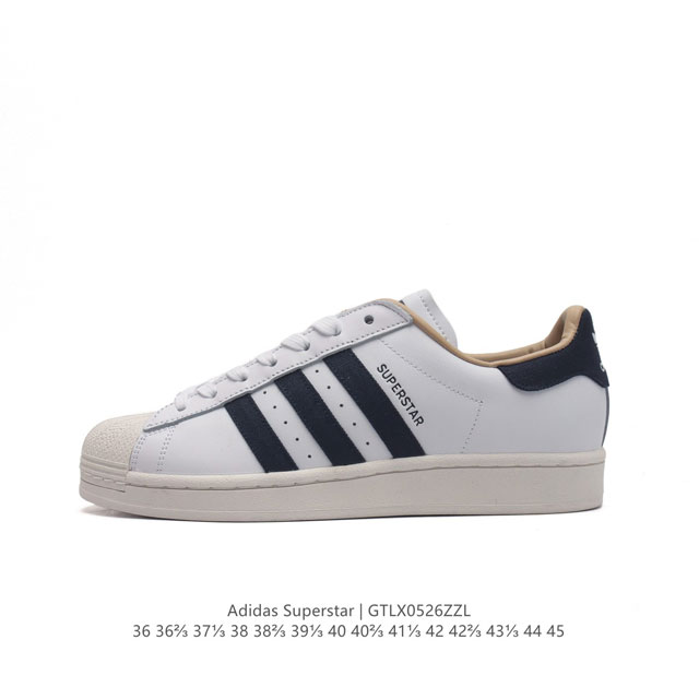 阿迪达斯 Adidas Superstar 三叶草经典贝壳头系列 新款休闲板鞋潮流男女士运动鞋 。鞋面柔软皮革材质 标志性的贝壳鞋头，锯齿三条纹，简约的线条。就