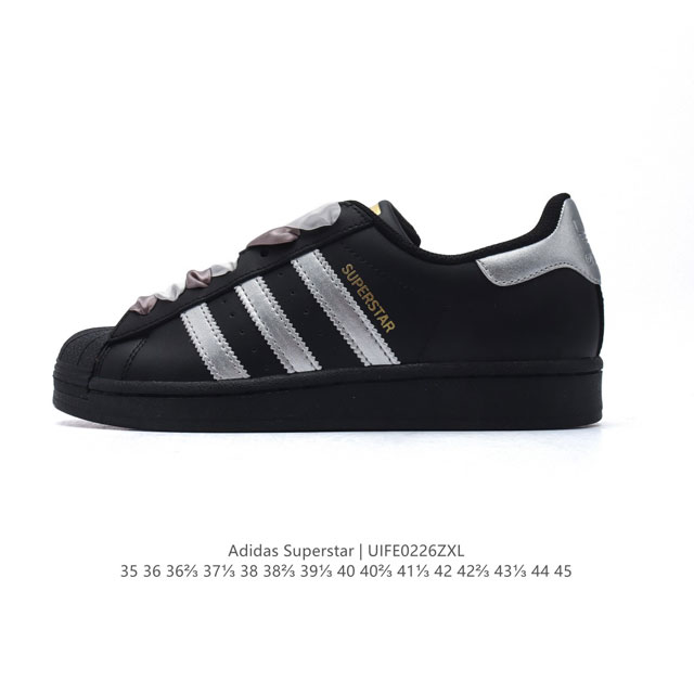 阿迪达斯 Adidas Superstar 三叶草经典贝壳头系列 新款休闲板鞋潮流男女士运动鞋 。鞋面柔软皮革材质 标志性的贝壳鞋头，锯齿三条纹，简约的线条。就