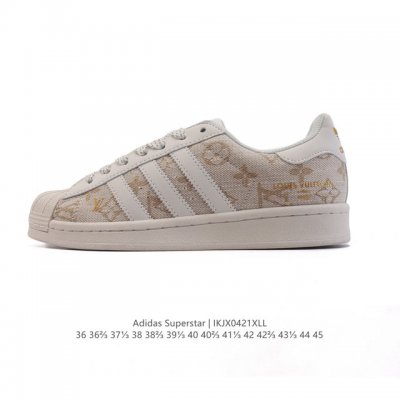 公司级 阿迪达斯 Adidas Superstar 2025年新款鞋子 蛇年新款 经典贝壳头系列 新款休闲板鞋潮流男女士运动鞋 鞋面织物拼接材质 标志性的贝壳鞋