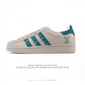 公司级 阿迪达斯 Adidas Superstar 2025年新款鞋子 蛇年新款 经典贝壳头系列 新款休闲板鞋潮流男女士运动鞋 鞋面柔软皮革拼接材质 标志性的贝
