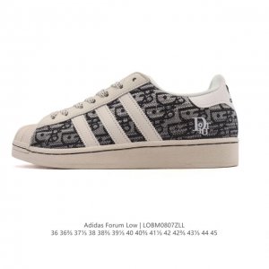 阿迪达斯 Adidas Superstar 2025年新款鞋子 蛇年新款 迪奥联名 经典贝壳头系列 新款休闲板鞋潮流男女士运动鞋 。鞋面织物拼接材质 标志性的贝