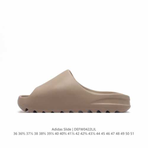 阿迪达斯 Adidas Yeezy Slide 经典运动拖鞋时尚厚底增高男女一字拖鞋。Yeezy Slide椰子拖鞋的外观十分吸引人，融合了舒适与时尚的元素，延