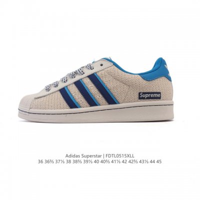 公司级 阿迪达斯 新款 Adidas Superstar 三叶草 经典贝壳头系列 新款休闲板鞋潮流男女士运动鞋 鞋面织物网面材质 标志性的贝壳鞋头 锯齿三条纹