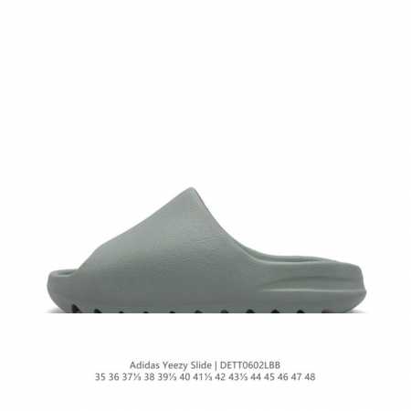阿迪达斯 Adidas Yeezy Slide 经典运动拖鞋时尚厚底增高男女一字拖鞋。Yeezy Slide椰子拖鞋的外观十分吸引人，融合了舒适与时尚的元素，延 - 点击图像关闭