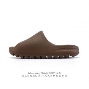 70 阿迪达斯 Adidas Yeezy Slide 经典运动拖鞋时尚厚底增高男女一字拖鞋 防滑锯齿鞋底。Yeezy Slide椰子拖鞋的外观十分吸引人，融合了