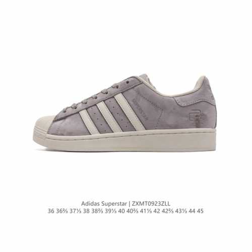 阿迪达斯 Adidas Superstar 三叶草经典贝壳头系列 新款休闲板鞋潮流男女士运动鞋 。鞋面柔软皮革材质 标志性的贝壳鞋头，锯齿三条纹，简约的线条。就