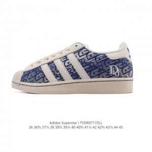 阿迪达斯 Adidas Superstar 2025年新款鞋子 蛇年新款 迪奥联名 经典贝壳头系列 新款休闲板鞋潮流男女士运动鞋 。鞋面织物拼接材质 标志性的贝