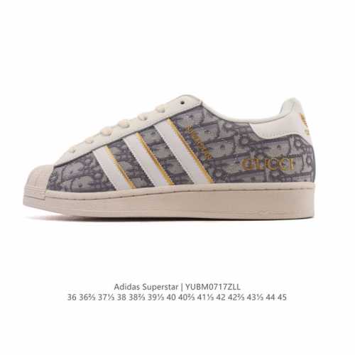 阿迪达斯 Adidas Superstar 2025年新款鞋子 蛇年新款 迪奥联名 经典贝壳头系列 新款休闲板鞋潮流男女士运动鞋 。鞋面织物拼接材质 标志性的贝