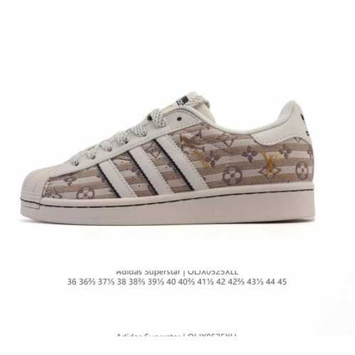 公司级 阿迪达斯 Adidas Superstar 2025年新款鞋子 蛇年新款经典贝壳头系列 新款休闲板鞋潮流男女士运动鞋 鞋面柔软织物拼接材质 标志性的贝壳